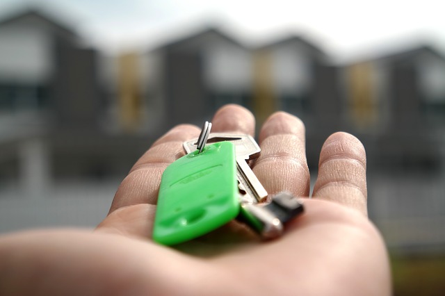 Property Manager holding a set of keys